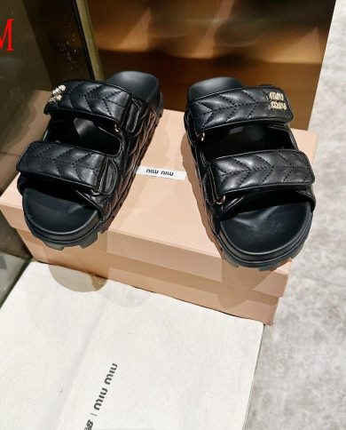 miumiu  Ladies leather slippers