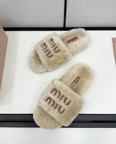 miumiu  Lady slippers