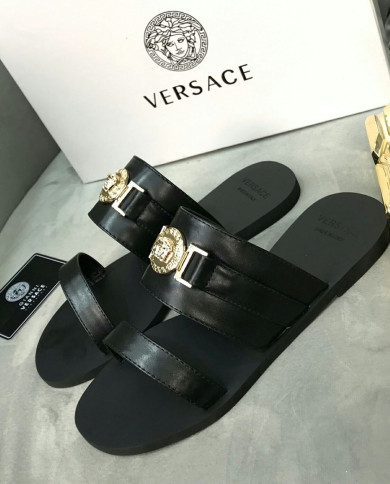 Versace  Flat-heeled slippers for women