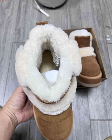 UGG Women’s Shearling Lined Mid-Calf Snow Boots