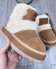 UGG Women’s Shearling Lined Mid-Calf Snow Boots