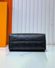 Louis Vuitton Embossed Chain Tote Bag