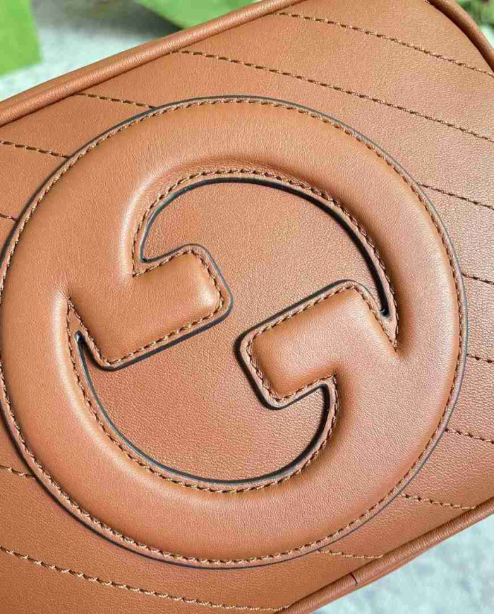 Gucci GG Embossed Leather Camera Bag with Tassel