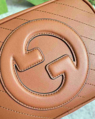 Gucci GG Embossed Leather Camera Bag with Tassel