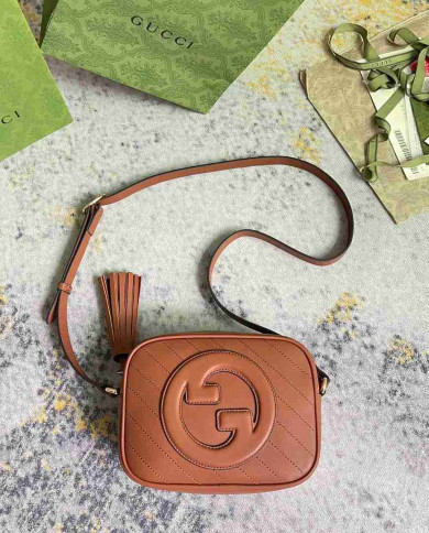 Gucci GG Embossed Leather Camera Bag with Tassel