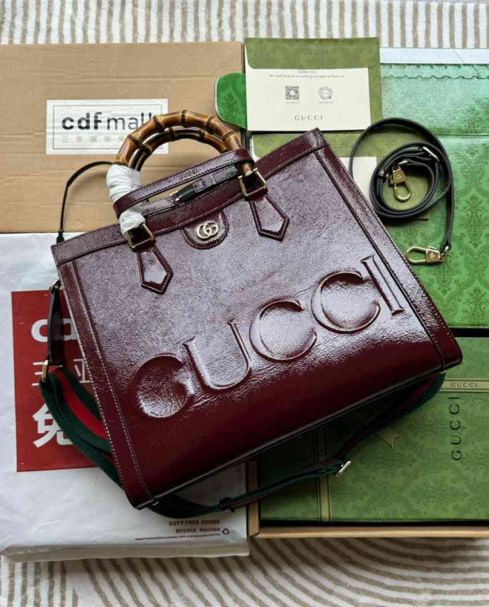 GUCCI Embossed Logo Top Handle Bag