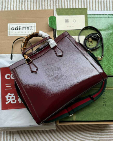 GUCCI Embossed Logo Top Handle Bag