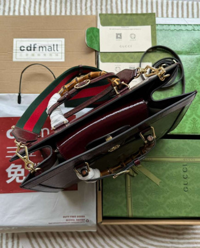 GUCCI Embossed Logo Top Handle Bag