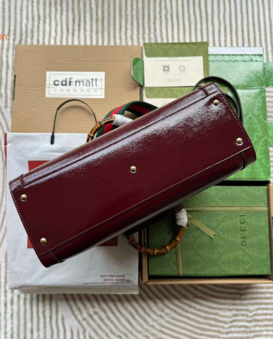 GUCCI Embossed Logo Top Handle Bag