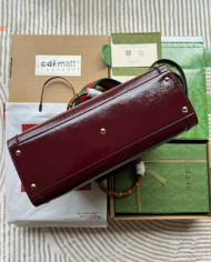 GUCCI Embossed Logo Top Handle Bag