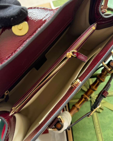 GUCCI Embossed Logo Top Handle Bag