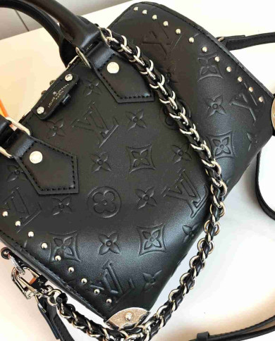 LV Embossed Top Handle Crossbody Bag