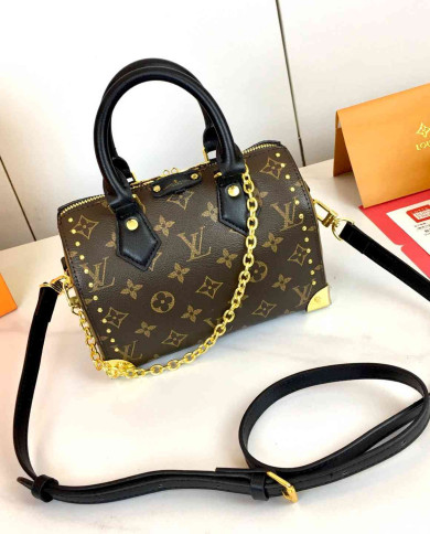 LV Embossed Top Handle Crossbody Bag