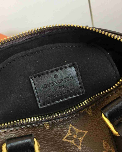 LV Embossed Top Handle Crossbody Bag
