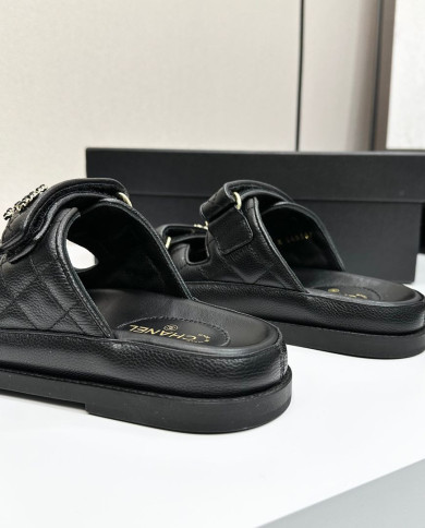 Chanel Women's Quilted Buckle Platform Slippers