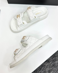 Chanel Women's Quilted Buckle Platform Slippers