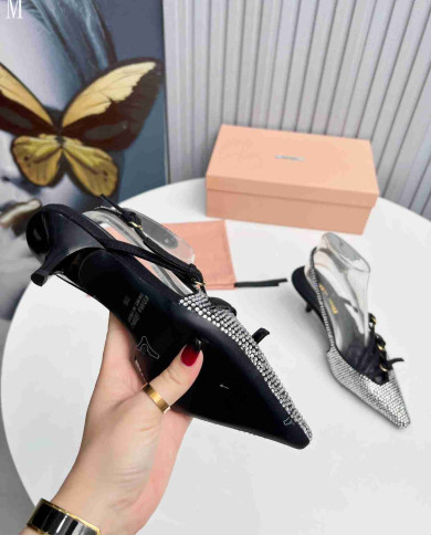 Miu Miu Rhinestone Pointed Toe Slingback shoes